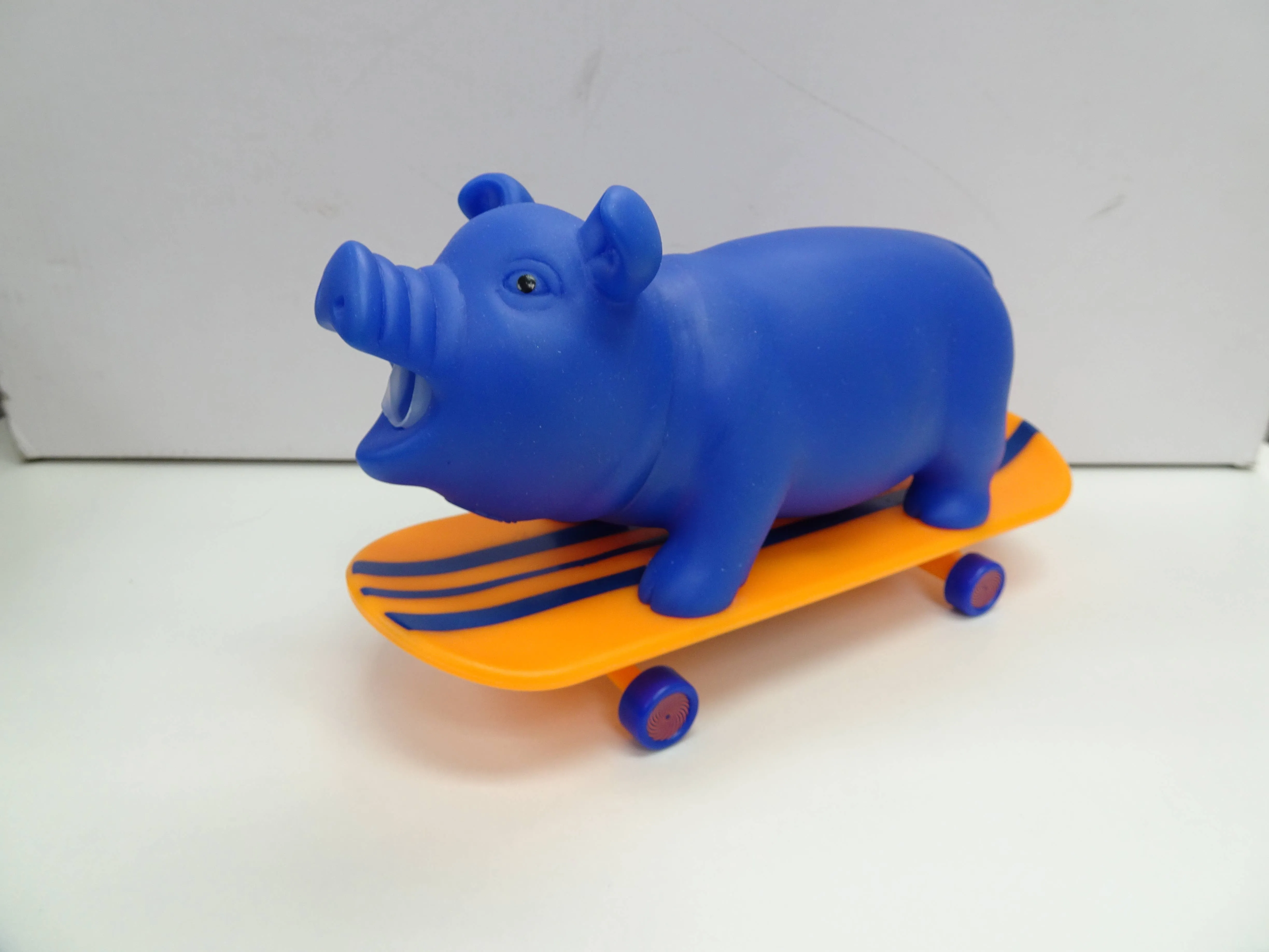 Squeeze Me Skating Piggy Toy for Kids