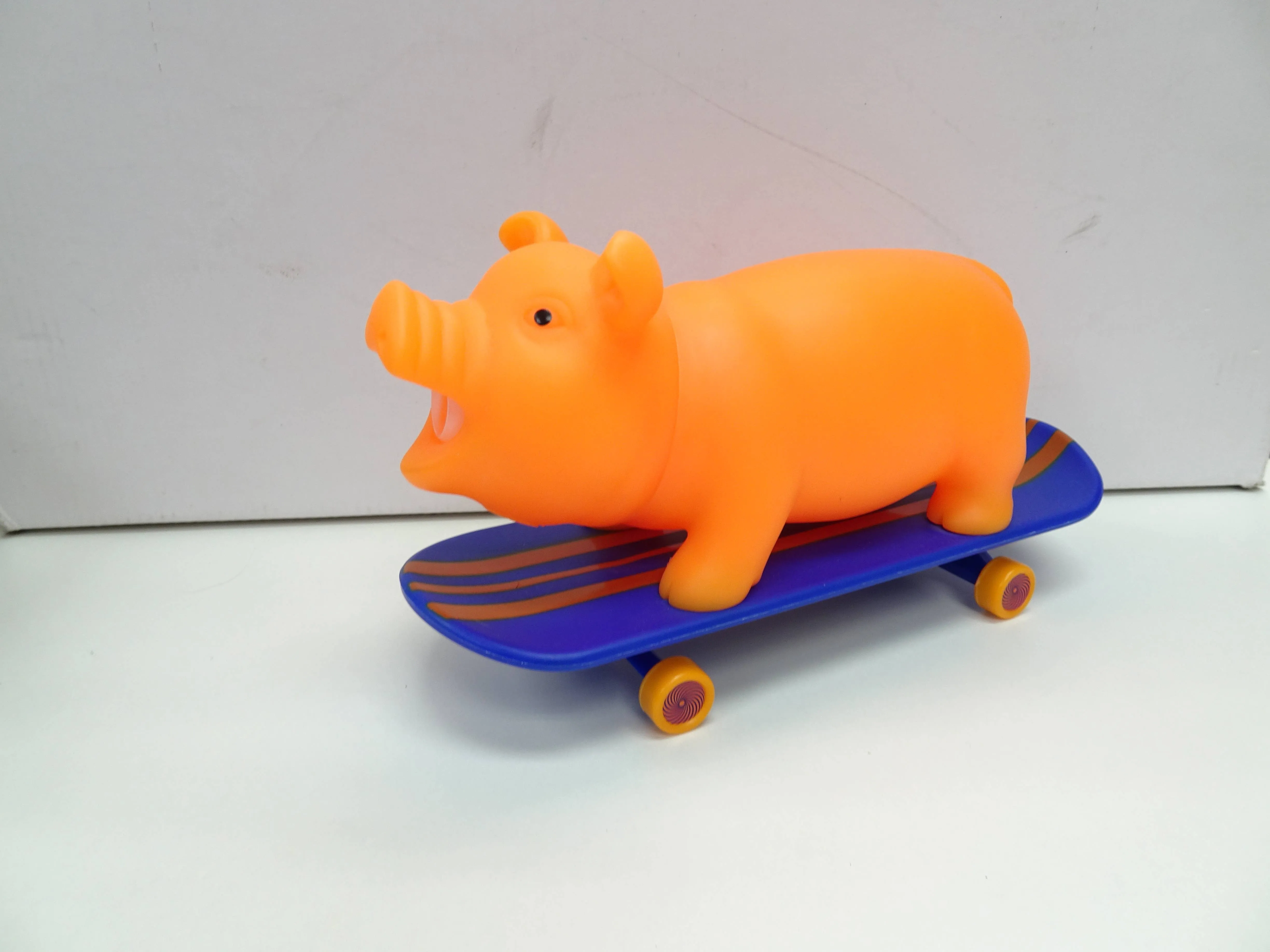 Squeeze Me Skating Piggy Toy for Kids