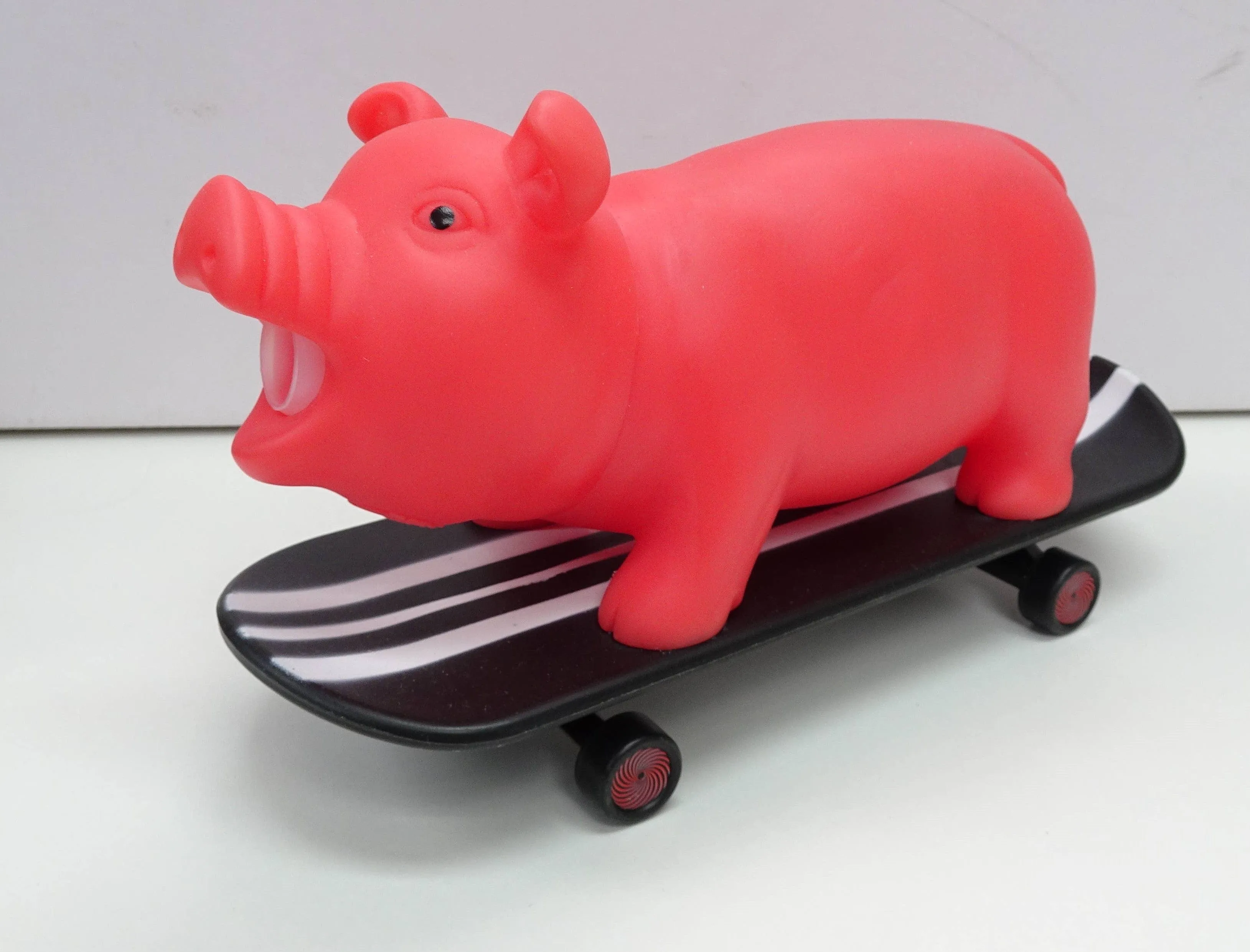 Squeeze Me Skating Piggy Toy for Kids